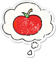 cartoon apple and thought bubble as a distressed worn sticker