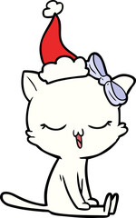 line drawing of a cat with bow on head wearing santa hat