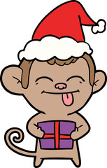 funny line drawing of a monkey with christmas present wearing santa hat