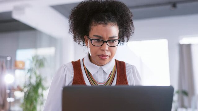 Stress, confused and black woman reading email on laptop, worried and concentrating in office. Glitch, problem and internet delay with female corporate employee reading scam alert, 404 or audit