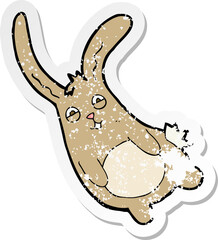 retro distressed sticker of a funny cartoon rabbit