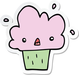 sticker of a cartoon cupcake