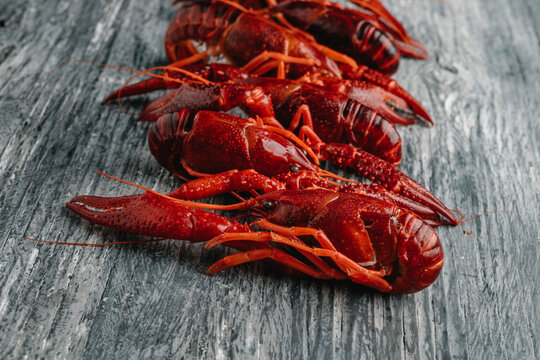 closeup of some cooked crayfish on a table