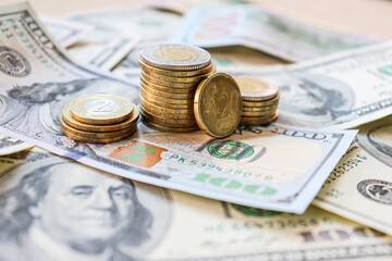 Dollar bills laid out on table. Three different columns of coins, 20 cents coin, financial crisis, money, finance, savings, salary, bank, euro cents. Photo, macro photography