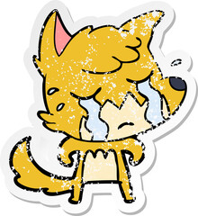 distressed sticker of a crying fox cartoon