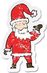 retro distressed sticker of a cartoon santa claus
