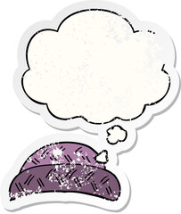 cartoon hat and thought bubble as a distressed worn sticker