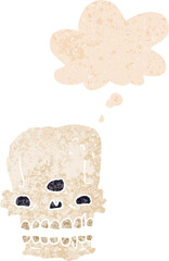 cartoon spooky skull and thought bubble in retro textured style