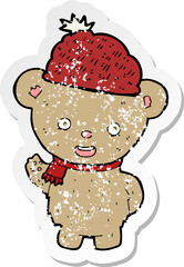 retro distressed sticker of a cartoon bear in hat