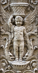 Stone carving decor. Architectural decoration of the facade of the building