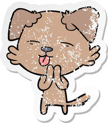 distressed sticker of a cartoon dog sticking out tongue