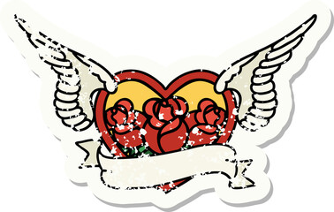 traditional distressed sticker tattoo of a flying heart with flowers and banner