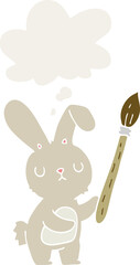 cartoon rabbit with paint brush and thought bubble in retro style