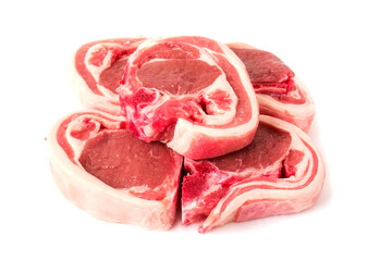 Four raw lamb chops on white background. Meat product of high quality and value. Food supply business.