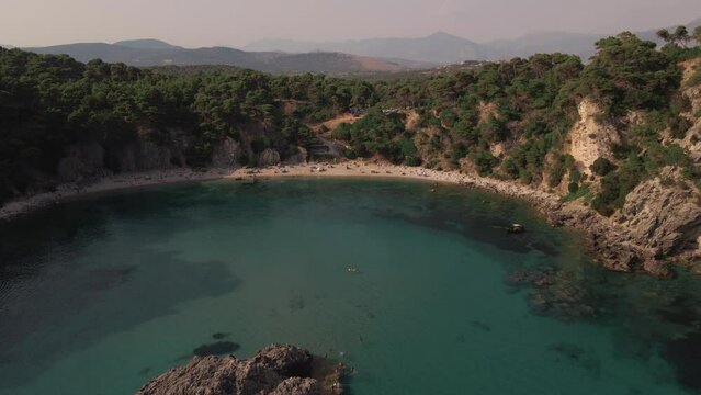 Beautiful beach Alonaki Fanariou. Beautiful coastline of Greece coast from drone. Aerial video view from drone on sea and coastal rocks in Mediterranean sea