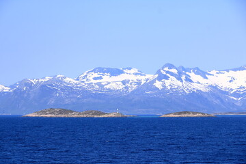Fototapeta na wymiar Mountains and fjords on Lofoten islands, Norway viewed from the boat