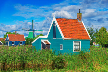 Panorama of traditional dutch houses at the Zaan river in Zaandijk, Netherlands.