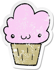 distressed sticker of a cartoon cupcake with face