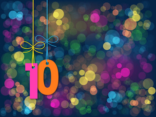 No 10 suspended by string on background of colorful bokeh lights