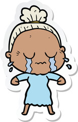 sticker of a cartoon crying old lady