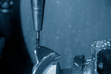 Close up the 5 axis machining center cutting the boat propeller parts  parts with taper ball end...