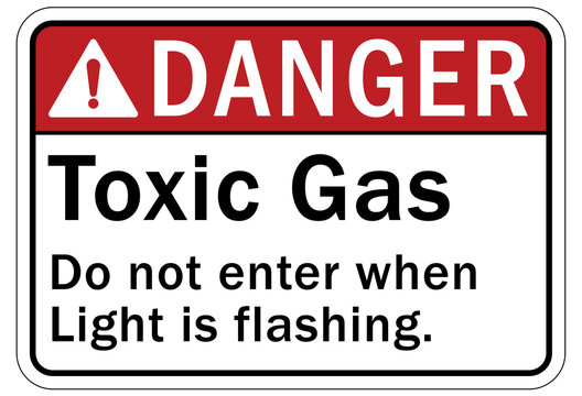 Toxic chemical warning sign and labels toxic gas. Do not enter when light is flashing