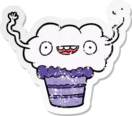 distressed sticker of a cartoon cupcake