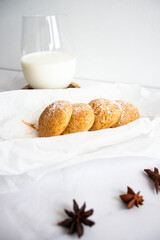 
Photo of oatmeal cookies, cookies, cinnamon, black coffee. on a white table