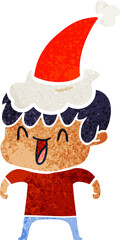 retro cartoon of a laughing boy wearing santa hat