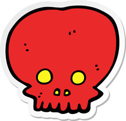 Fototapeta premium sticker of a cartoon spooky skull symbol