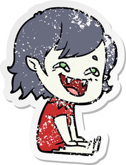 distressed sticker of a cartoon laughing vampire girl