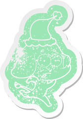 cartoon distressed sticker of a unsure elephant running away wearing santa hat