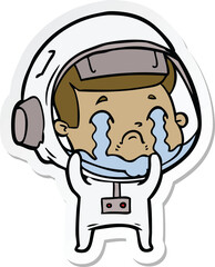 sticker of a cartoon crying astronaut