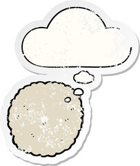 cartoon biscuit and thought bubble as a distressed worn sticker