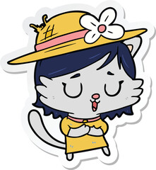 sticker of a cartoon cat wearing hat