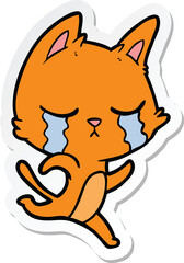 sticker of a crying cartoon cat