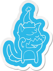 friendly cartoon  sticker of a fox waking up wearing santa hat