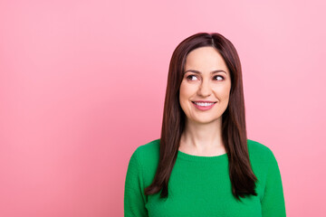 Fototapeta premium Photo of dreamy adorable woman wear green sweater looking empty space isolated pink color background