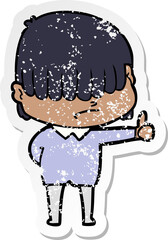 distressed sticker of a cartoon boy with untidy hair