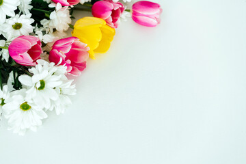 Bouquet of flowers on a white background place for text horizontally