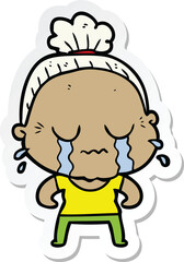 Obraz premium sticker of a cartoon crying old lady