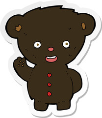 sticker of a cartoon waving black bear cub