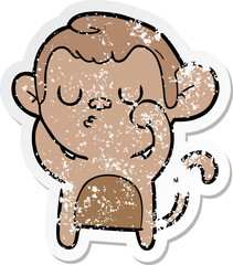 distressed sticker of a cartoon monkey