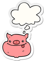 cartoon happy pig face and thought bubble as a printed sticker