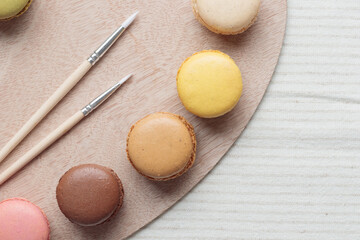 Colorful pastel eco handmade natural macaroon palette on white table. Gift for 8 March, International Women's Day, Valentine Day