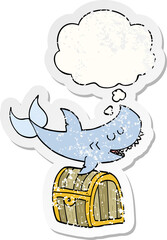 cartoon shark swimming over treasure chest and thought bubble as a distressed worn sticker