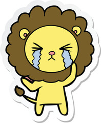 sticker of a cartoon crying lion