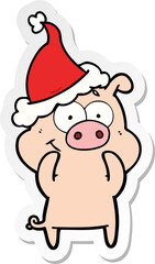 happy sticker cartoon of a pig wearing santa hat