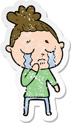 distressed sticker of a cartoon crying woman