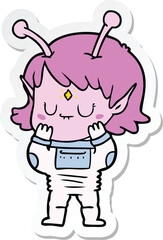 sticker of a cartoon alien girl